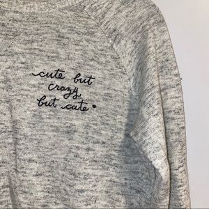 Cute but crazy but cute thin grey crew sweater